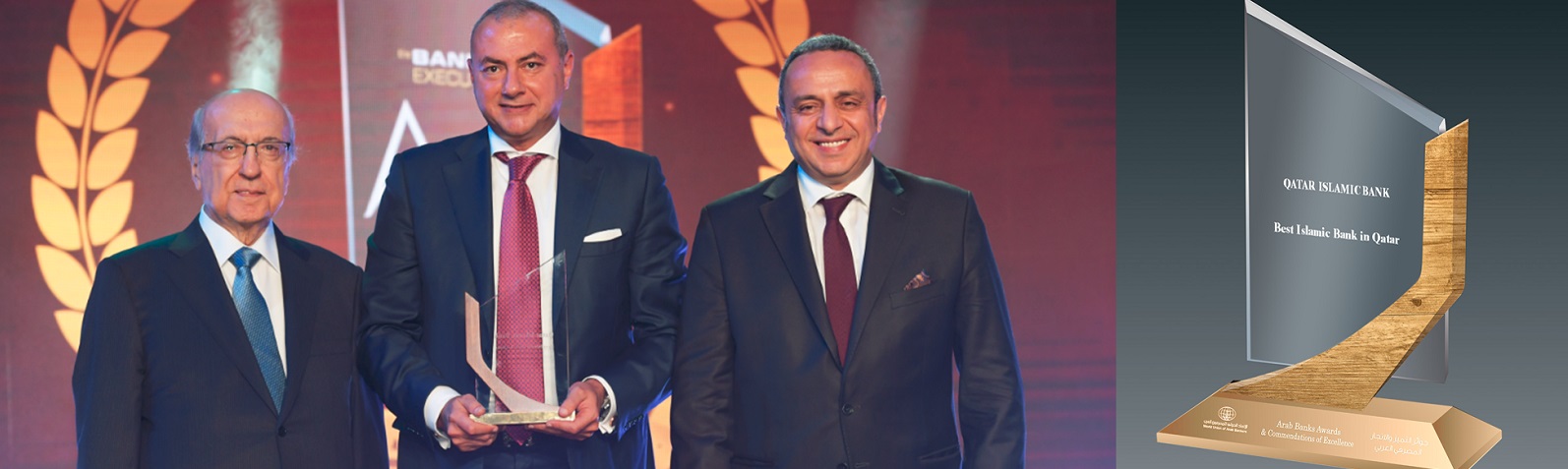 Photo showing group chief executive receiving award.