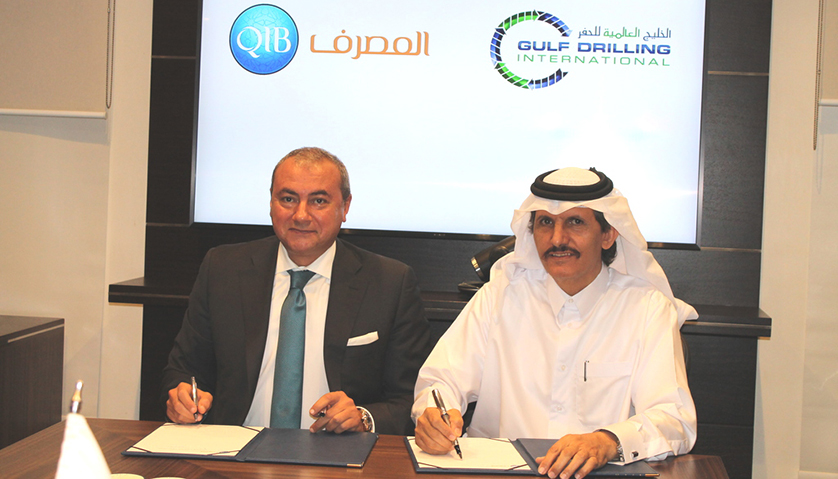 Photo showing agreement signing ceremony.
