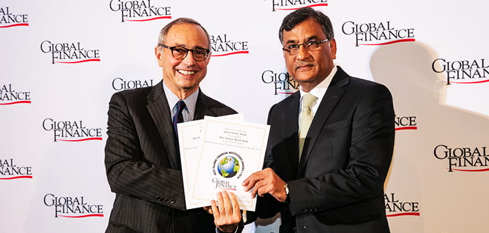 Photo showing representative receiving award on behalf of organization.
