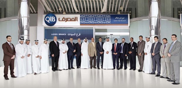 Group photo from a branch opening event.
