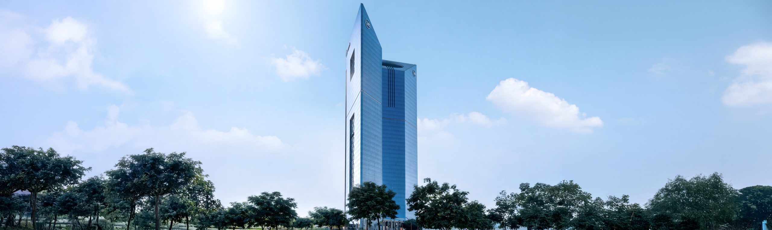 Hero banner showing Qatar Islamic Bank tower building