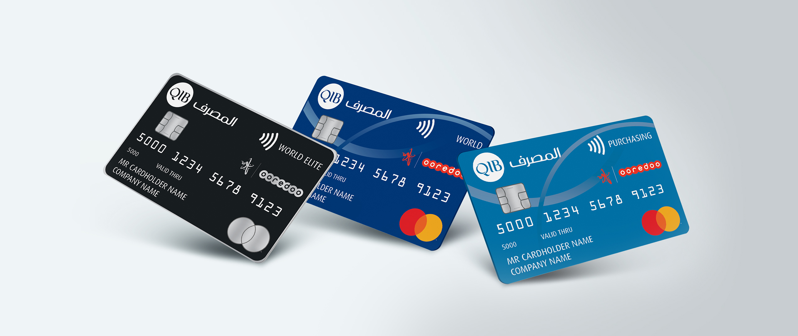 Set of business payment cards displayed together on neutral background.