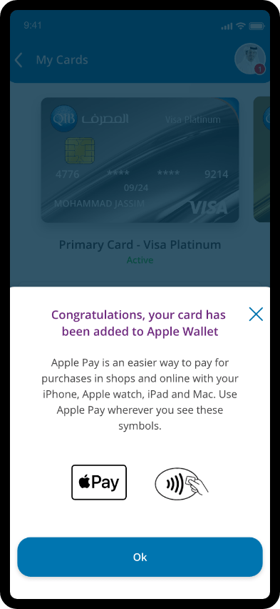 Apple Wallet screen showing Agree button to confirm adding the QIB card to Apple Pay.